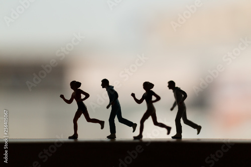 Miniature people: Silhouette of a runner , Health And lifestyle concepts.