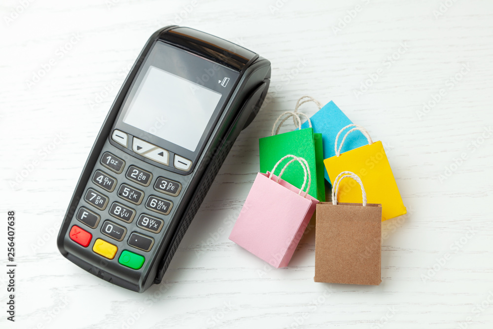 POS Payment terminal and shopping packages. POS Payment terminal and shopping packages.