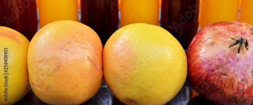 colorful glass bottles of  juice