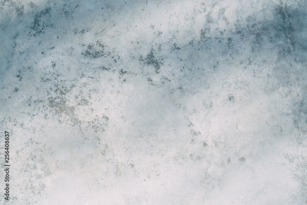 Obraz premium The texture of old white concrete. Sunlight and shadows on the wall.