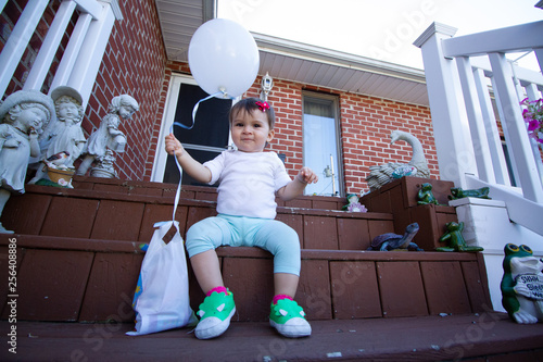 little girl with balloon