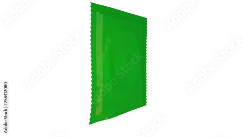 Condom packaging spins on white background