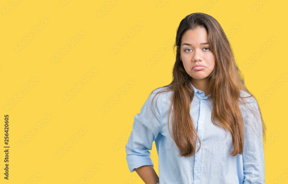 Young beautiful brunette business woman over isolated background depressed and worry for distress, crying angry and afraid. Sad expression. Young beautiful brunette business woman over isolated background depressed and worry for distress, crying angry and afraid. Sad expression.