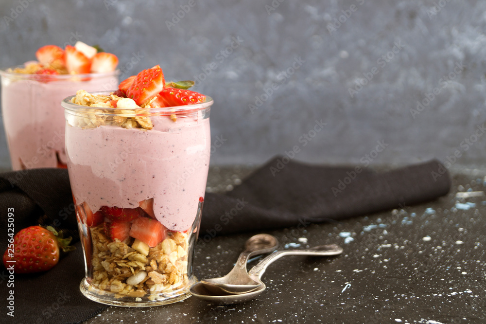 Homemade natural yogurt with strawberries and muesli. Homemade natural yogurt with strawberries and muesli.