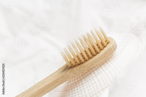 Close up of bamboo toothbrush  zero waste concept