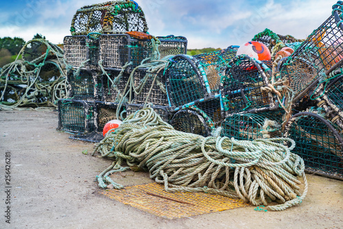 Ropes and various fishing industry tools in Castletownbere harbor photo