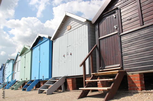 Beach huts at Walton on the Naze, Beach Huts, Essex, England,  beach huts are traditional seaside feature for people to change or base themselves. Walton-on-naze, Essex, UK © cheekylorns