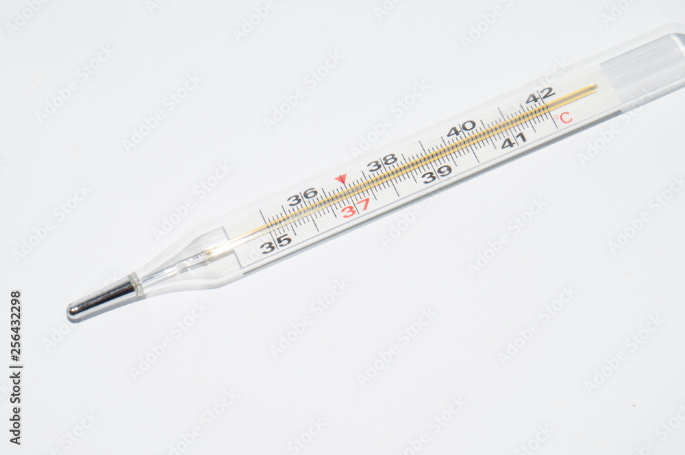 Thermometer on a white background. Concept health seasonal illness flu Thermometer on a white background. Concept health seasonal illness flu