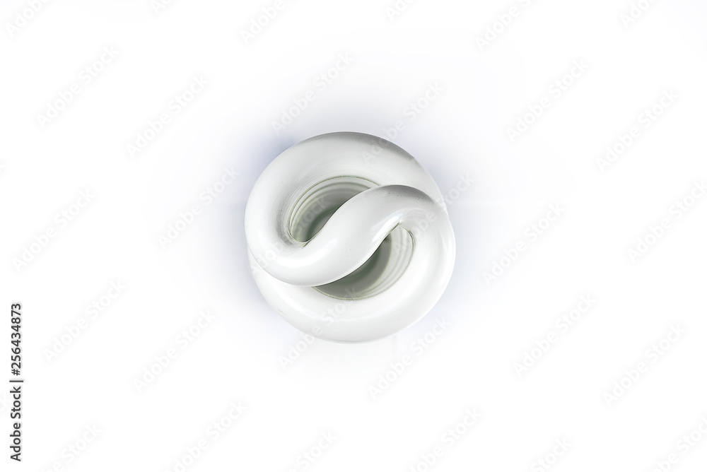 Energy saving eco lamp isolate on white background. Top view Energy saving eco lamp isolate on white background. Top view