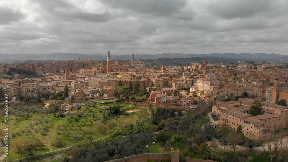 Siena, Tuscany. Beautiful aerial city skyline from surrounding hills