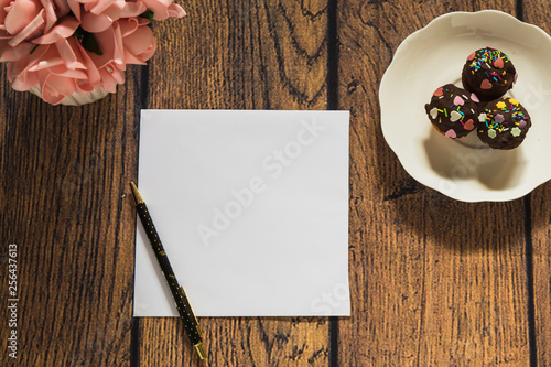 Card mockup with flowers, coffee and cookies