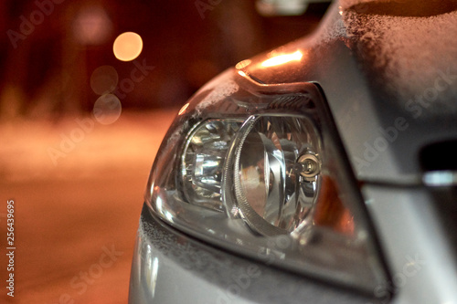 Detail photo of headlights of a car