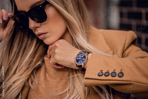 Stylish elegant watch on woman hand photo
