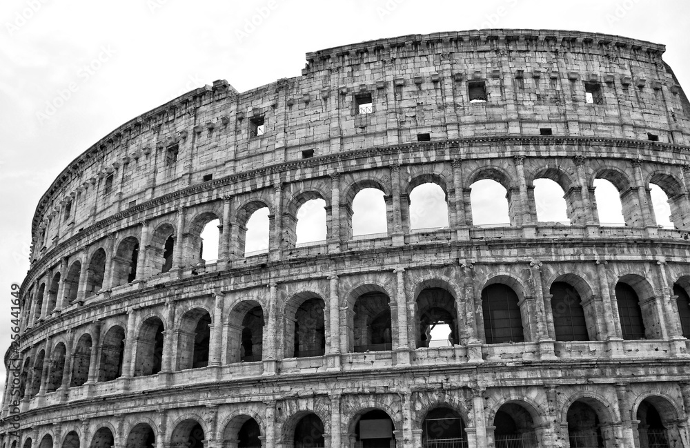The Coliseum is an oval amphitheatre in the centre of the city of Rome, Italy. It is the largest amphitheatre ever built. Ancient architecture. Landmarks of Italy. Black and White Photography