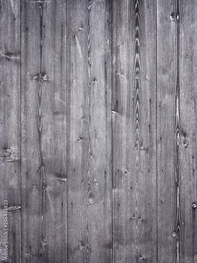 Naklejka premium grey brown part of planks on wooden shed or barn