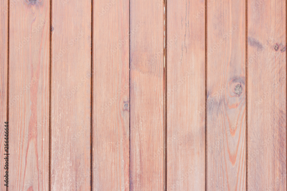 Naklejka premium wooden background. Wood texture,wooden fence covered with stain
