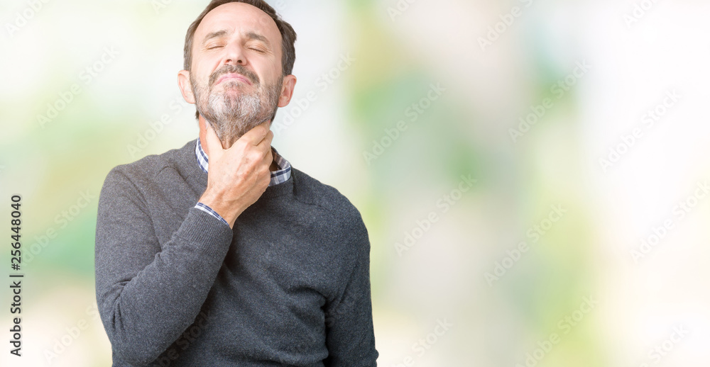Handsome middle age senior man wearing a sweater over isolated background Touching painful neck, sore throat for flu, clod and infection