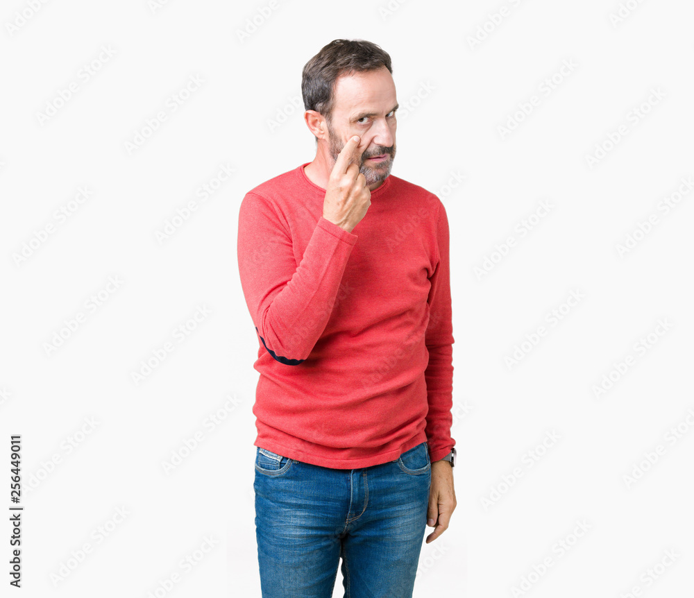 Handsome middle age hoary senior man wearing winter sweater over isolated background Pointing to the eye watching you gesture, suspicious expression Handsome middle age hoary senior man wearing winter sweater over isolated background Pointing to the eye watching you gesture, suspicious expression