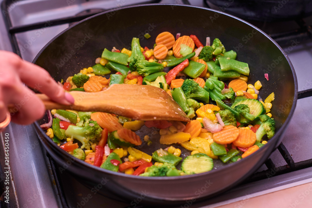 A mixture of frozen different vegetables A mixture of frozen different vegetables