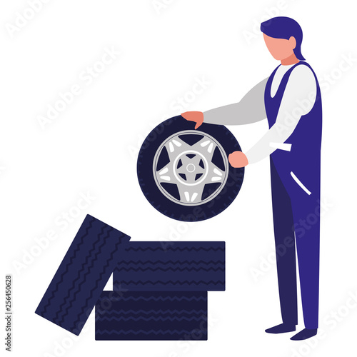 mechanic worker with tires car