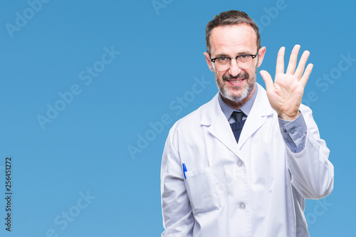 Middle age senior hoary professional man wearing white coat over isolated background showing and pointing up with fingers number five while smiling confident and happy. © Krakenimages.com