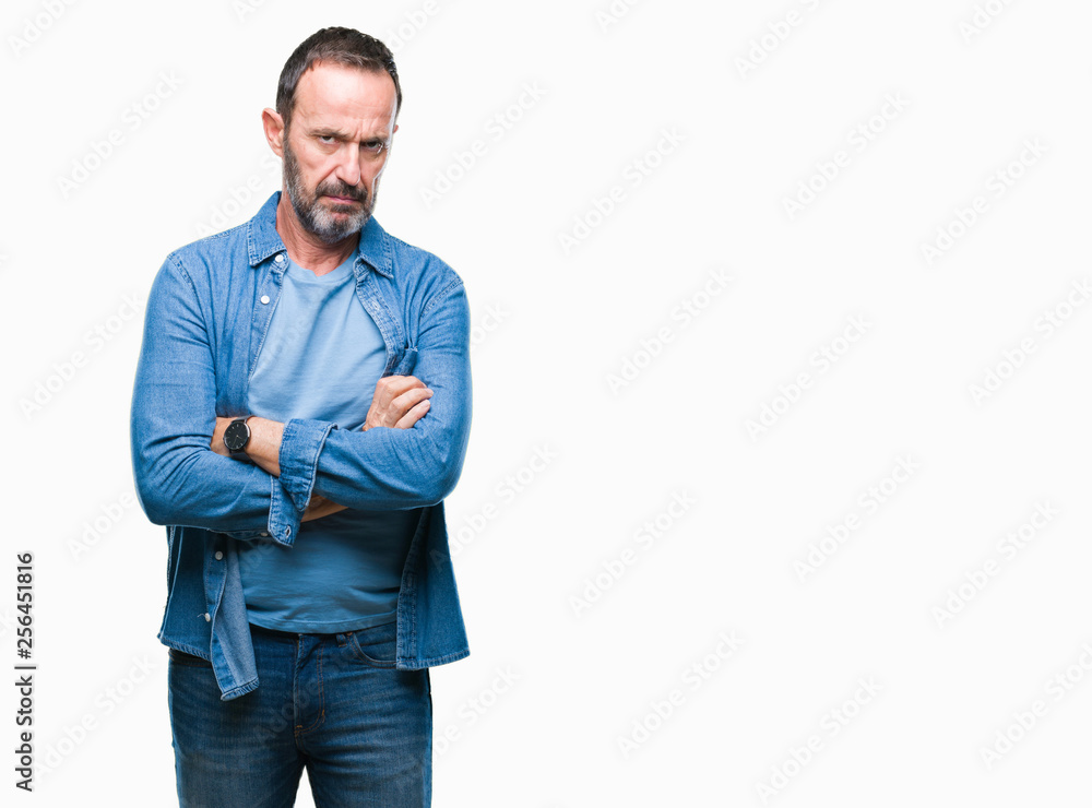 Middle age hoary senior man over isolated background skeptic and nervous, disapproving expression on face with crossed arms. Negative person. Middle age hoary senior man over isolated background skeptic and nervous, disapproving expression on face with crossed arms. Negative person.