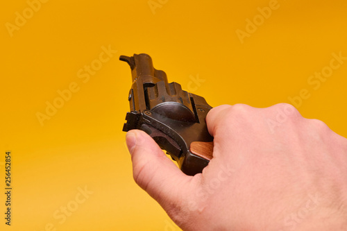 hand with a gun