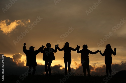 group of happy young people dancing at the beach on beautiful summer sunset .savsat/artvin/turkey