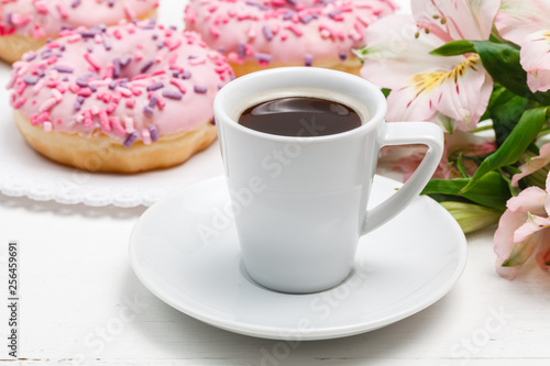 Coffee with glazed donuts, light breakfast snack