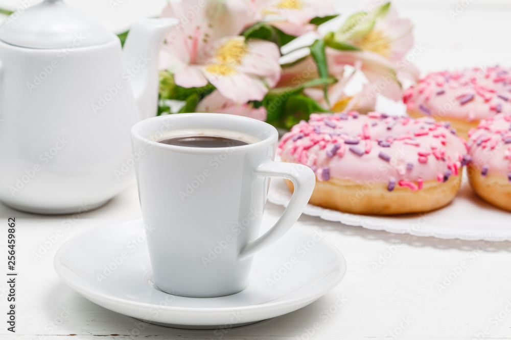 Coffee with glazed donuts, light breakfast snack