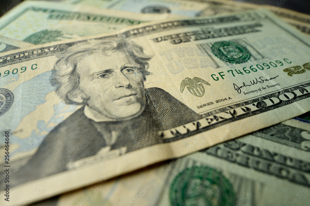 Money texture. Background of used dollars banknotes. Shallow depth of field. Money texture. Background of used dollars banknotes. Shallow depth of field.