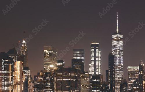 New York City skyline at night  color toning applied  USA.