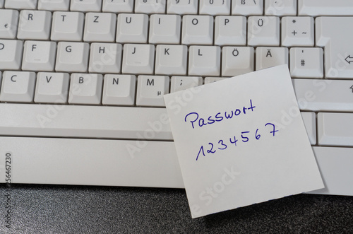 Note with the german word for password on a computer keyboard