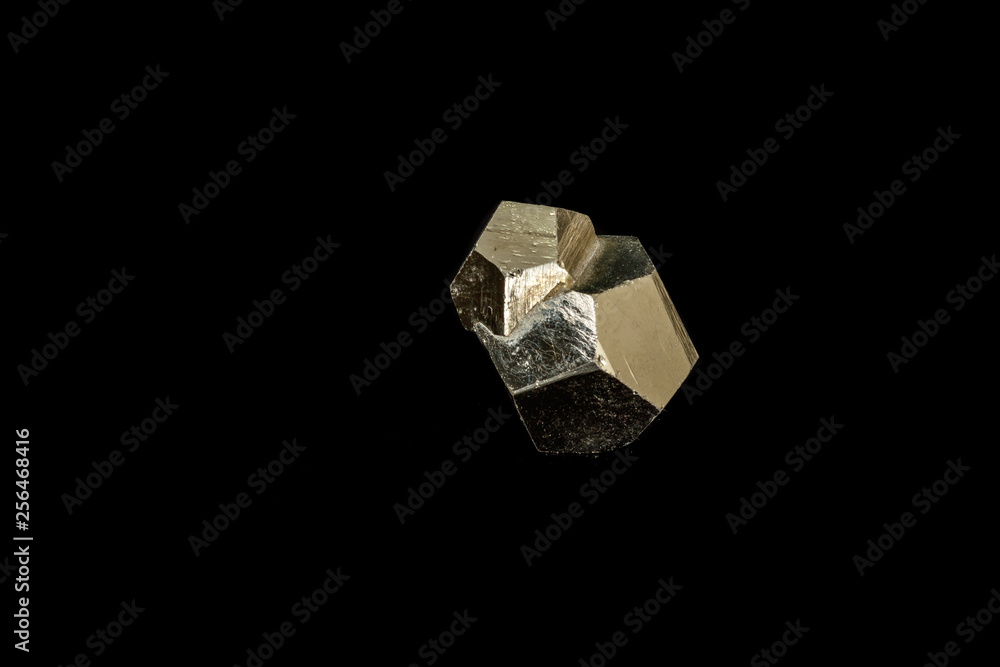 Macro mineral stone Pyrite on a black background Macro mineral stone Pyrite on a black background