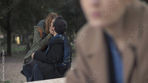 sad woman and happy couple flirting.stages of love:falling in love,break up