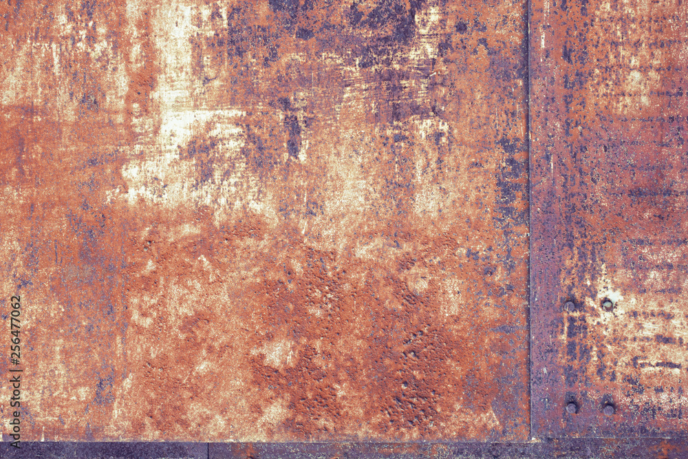 Colored rusty iron metal wall texture background.