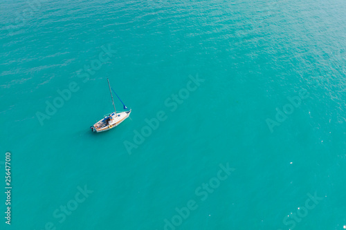 aerial view of boat in blue water © phpetrunina14