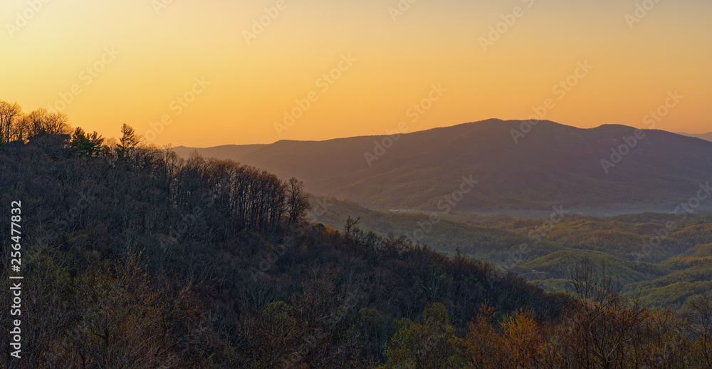 glowing spring sunrise over the Pisgah National Forest in North Carolina panoramic