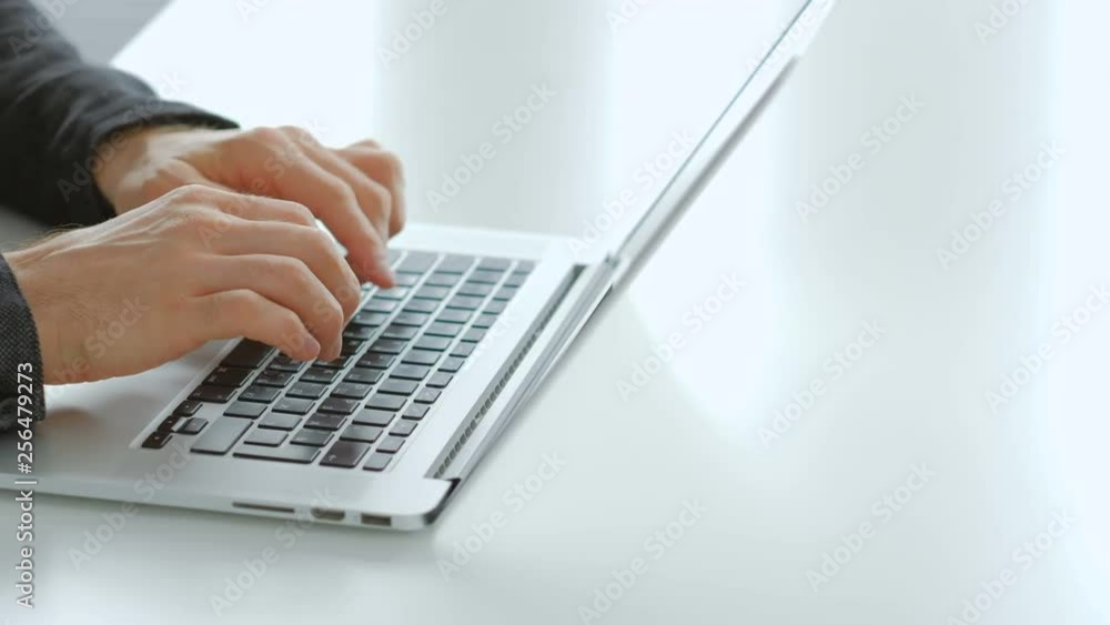 Data entry freelance job. Remote working and earning money online. Man hands typing on the laptop keyboard. Data entry freelance job. Remote working and earning money online. Man hands typing on the laptop keyboard.