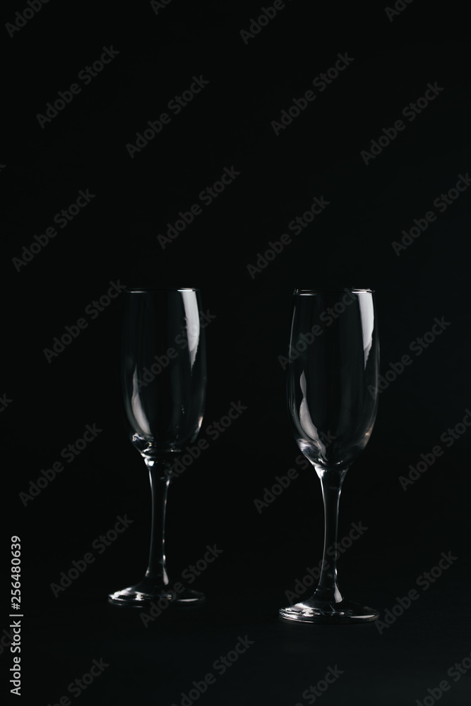 two glasses on black background two glasses on black background