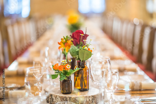 Bild auf Leinwand wedding table with floral arrangement prepared for reception, wedding, birthday