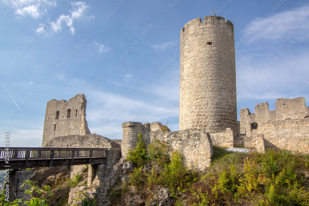 Burgruine Wolfstein old castle ruins with tower, blue sky
