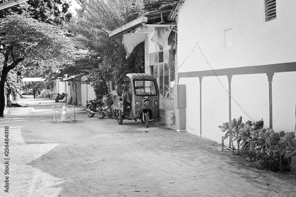 A three wheels vehicle on a Maldivian street (Ari Atoll, Maldives)