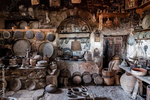 Old time village kitchen. Rustic cooking accesories in ancient pantry