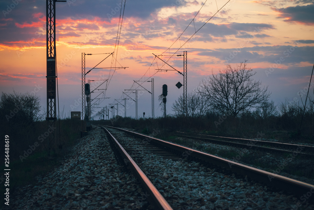 Sunset on the railroad tracks landscape.