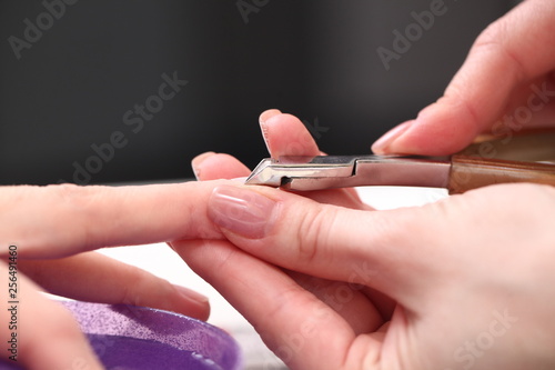 female nail manicure processing