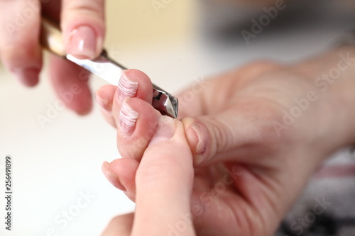 female nail manicure processing