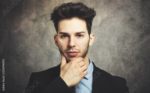 Young businessman in a thoughtful expression