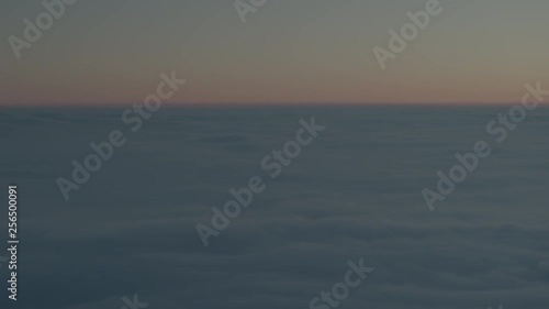 Wallpaper Mural Aerial drone view of sunrise over clouds high over mountains Torontodigital.ca