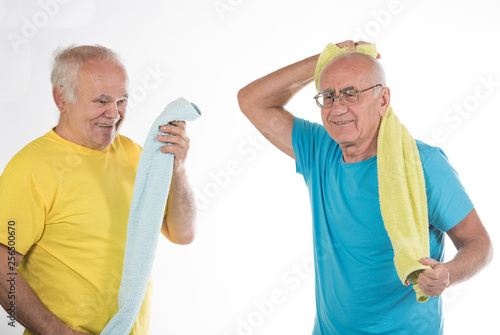 two senior men doing sport